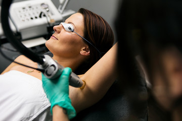 Spa: Female Patient Undergoing Laser Hair Removal Treatment