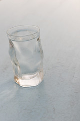 Glass of frozen water