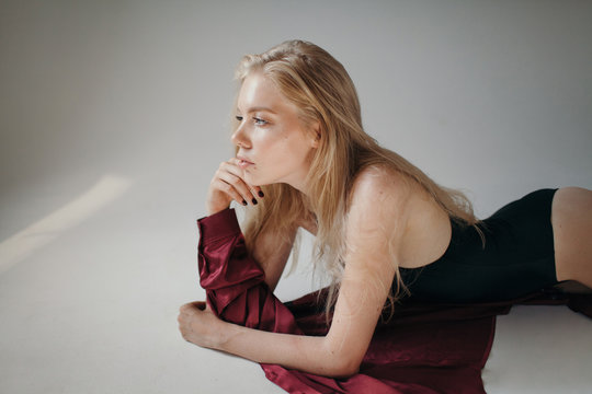 Studio portrait of blonde female