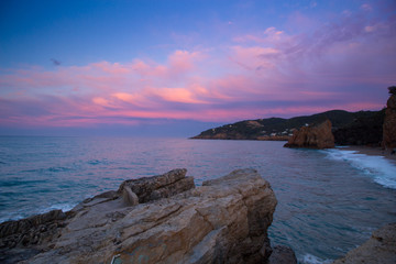 beach with rocks and sky