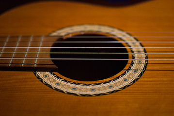 Obraz premium A close-up of the hole of the guitar body