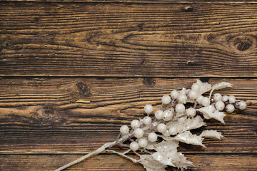 New year greeting card background on old wooden table with white branch. Space for text.