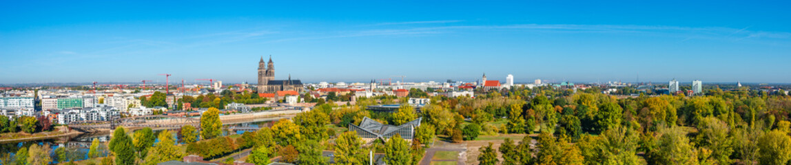 Fototapeta na wymiar Panoramic bird view of river Elbe, old and new town, parks in Magdeburg, Germany, late Autumn