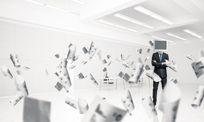 Businessman with monitor instead of head.