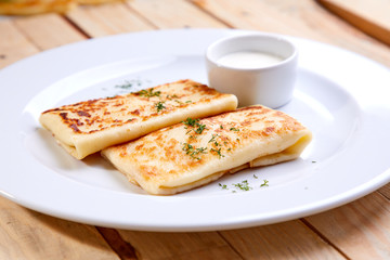 stuffed pancakes with sour cream