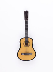 Fototapeta premium glossy guitar on a white background