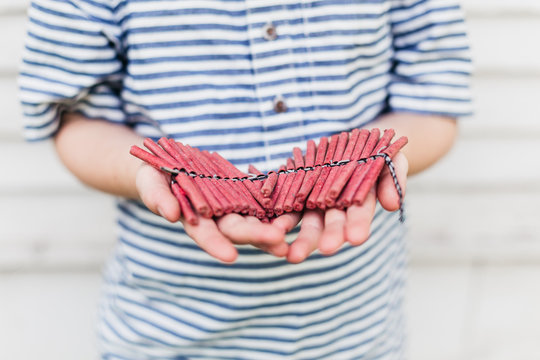 Holding firecrackers