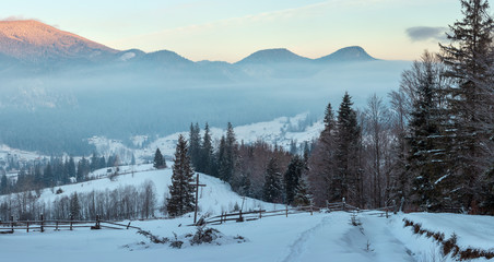 Sunrise winter Carpathian mountain village, Ukraine