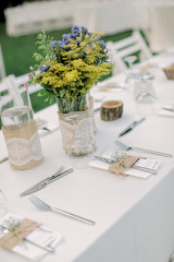 white chairs and white cover. wedding ceremony setup