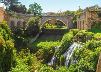 Naklejka premium Tivoli (Italy) - The nice little town on the hill in province of Rome, famous for the historical and touristic site Villa Adriana and Villa d'Este. Here a view of historic center.
