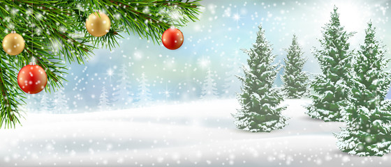 Christmas tree branch on winter landscape background. Background for a Christmas card. © belander