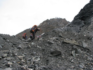 climber on top of mountain