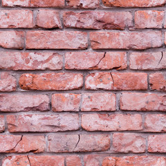 seamless old weathered red brick wall texture, background. exterior