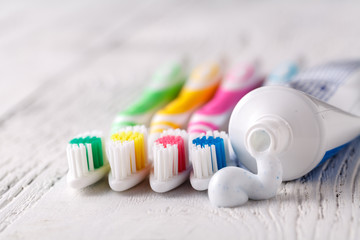 Fototapeta na wymiar Tube of toothpaste with breath strips. White background. Closeup.