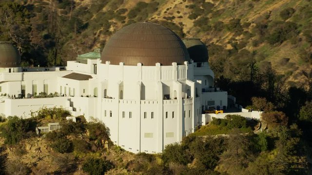 Aerial view at sunset of Griffith Park Observatory Los Angeles