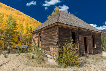 Historic deserted cabin surrounded by Autumn Color, outside of Silverton Colorado