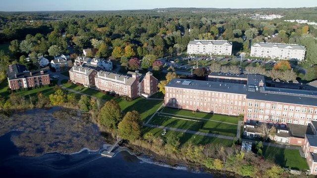 Aerial Drone - High Pan Over Property Of Old Textile Factory in Exeter, New Hampshire 4K