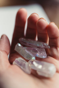 A woman holding crystals