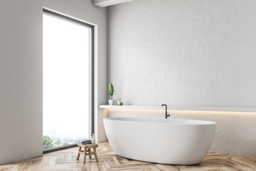 Naklejka na ściany i meble White tub in white bathroom corner