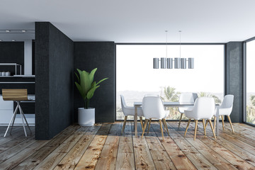 Black dining room interior, white chairs