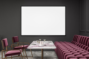 Gray restaurant with red sofa and chairs, poster