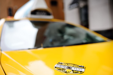 Typical American yellow badge taxi