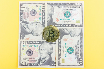 Background made from American dollars and bitcoin, dark base