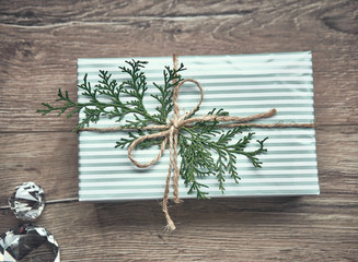 Christmas tree background. Christmas tree with gift decoration on wooden board. Holiday concept