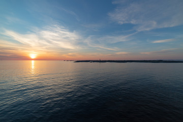 Naklejka premium Heading out to North Sea at sunset 