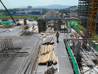 Construction site in progress at Malacca, Malaysia during daytime. Daily activity is ongoing. 