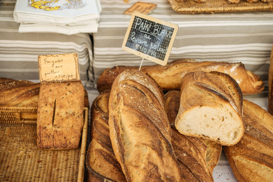 Fresh traditional french bread selling on a marketplace