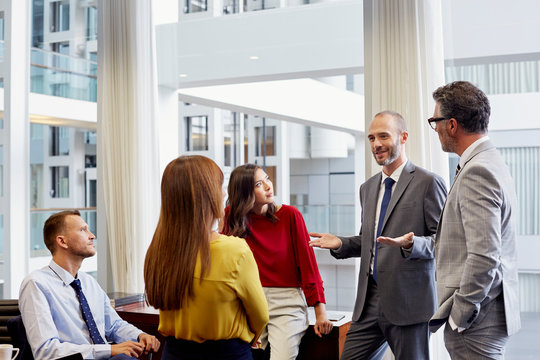 Businessman Gesturing While Discussing In Meeting