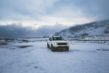 Car on Frozen Beach in Iceland