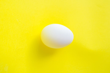 A egg on yellow background