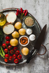 background of food ingredients on a tray. healthy food. full vegetable food on gray background