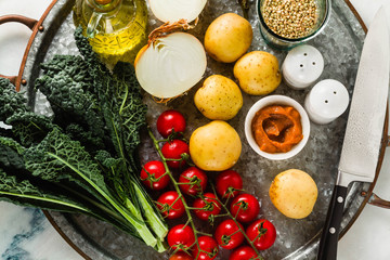 Fototapeta na wymiar background of food ingredients on a tray. healthy food. full vegetable food on the marble table