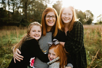 Happy Mom with Daughters