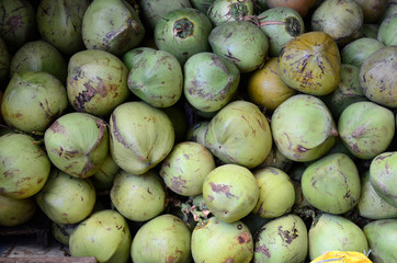 fresh young coconut symmetrically to attrack buyers at market stall