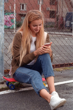Teen girl using smartphone