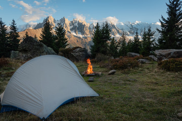 Camping, Tent with firelpace in front of Mont Blanc