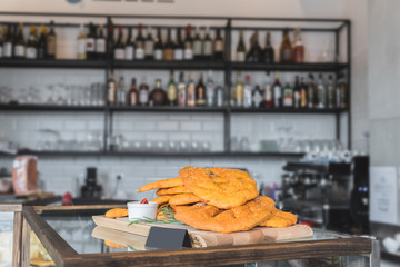 Rosamary fougasse on wooden plate