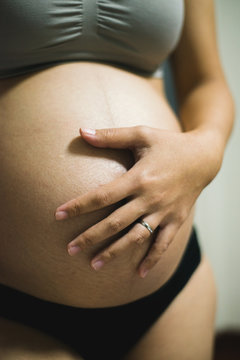 Pregnant Asian Woman