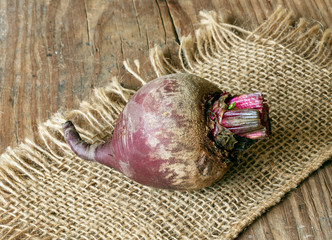 Organic beet on burlap.