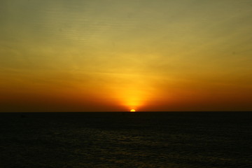 Naklejka na ściany i meble sunset over sea