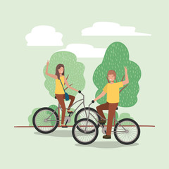 young couple on bicycle in the park