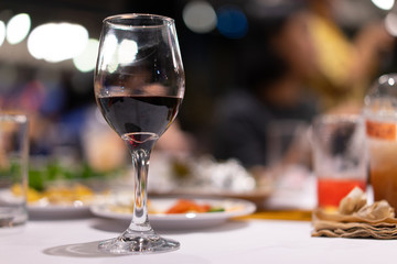 Wine glasses and wines at the night of the celebration.