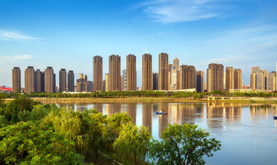 High rise building by the river © gui yong nian