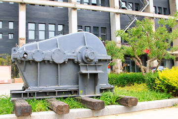huge gray mechanical equipment in an industrial park