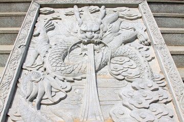 dragon king stone sculpture in a temple