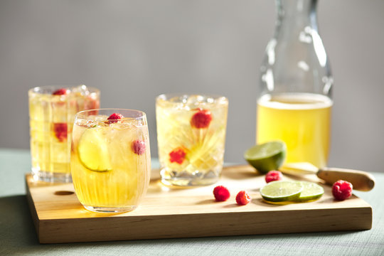 Tea kombucha with crushed ice, lime and raspberry.